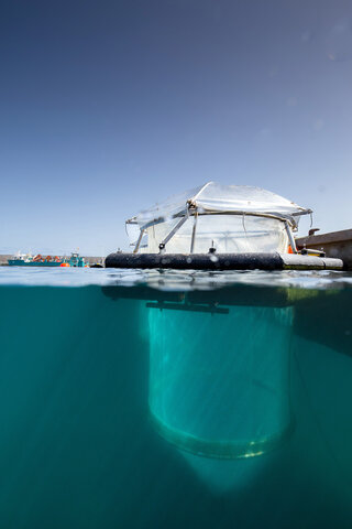 Mesocosm experiment as part of an Ocean Alkalinity Enhancement trial. Credit: Michael Sswat, GEOMAR